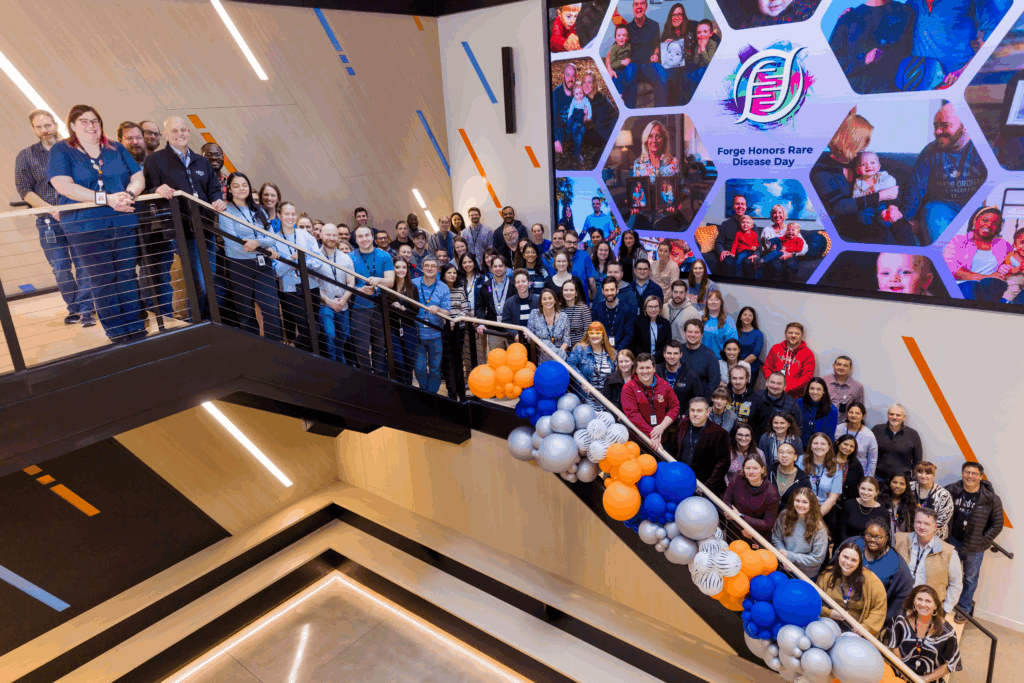 Forge team members at the Hearth pose for a group photo during Rare Disease Day.